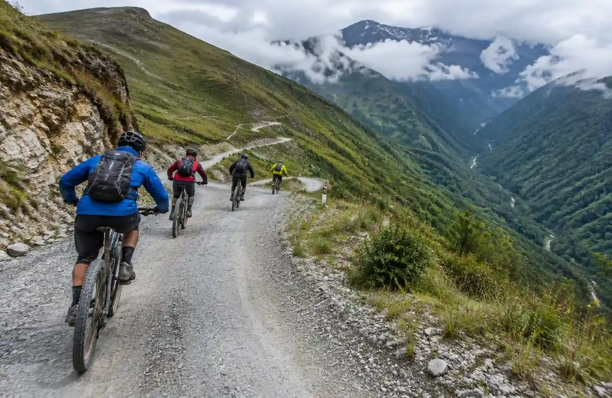 Riders downhill biking from Abra Malaga on the first day of the Inca Jungle trek
