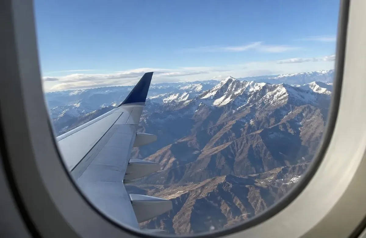 Andes mountains seen from the plane window on the lima to cusco flight