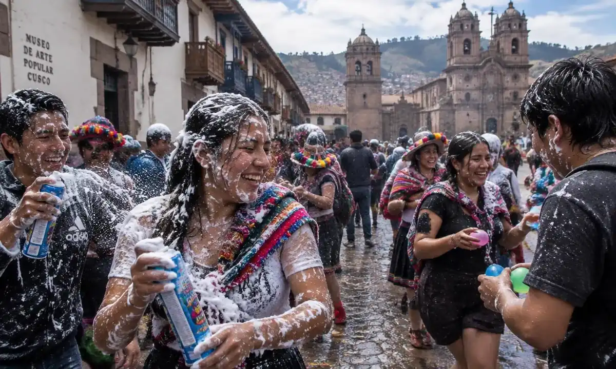 Carnival in Cusco in February with locals spraying foam near the Plaza de Armas