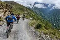 Riders downhill biking from Abra Malaga on the first day of the Inca Jungle trek