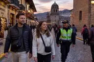 Tourist couple walking past tourism police on a Cusco street while asking is peru safe