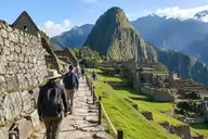 Visitors walking a roped one-way stone path on a Machu Picchu circuit