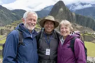 Senior couple with a local guide enjoying the view on a Machu Picchu tour
