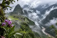 Mist rising from the Urubamba canyon around Machu Picchu, showing its humid cloud forest climate