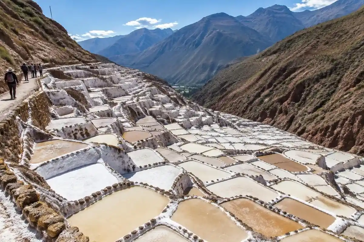 White terraced pools of the Maras salt mines on a super sacred valley tour